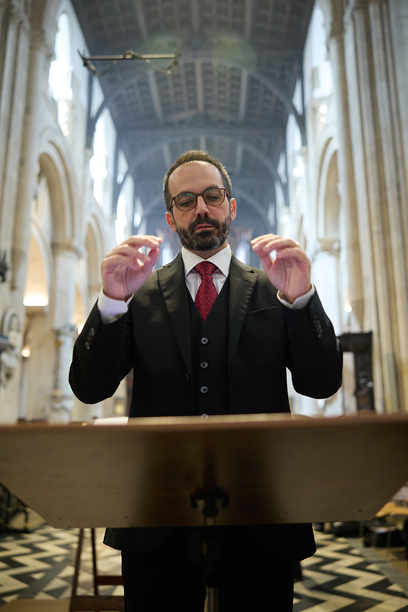 Luca Uggias conducting music for the ecumenical service 