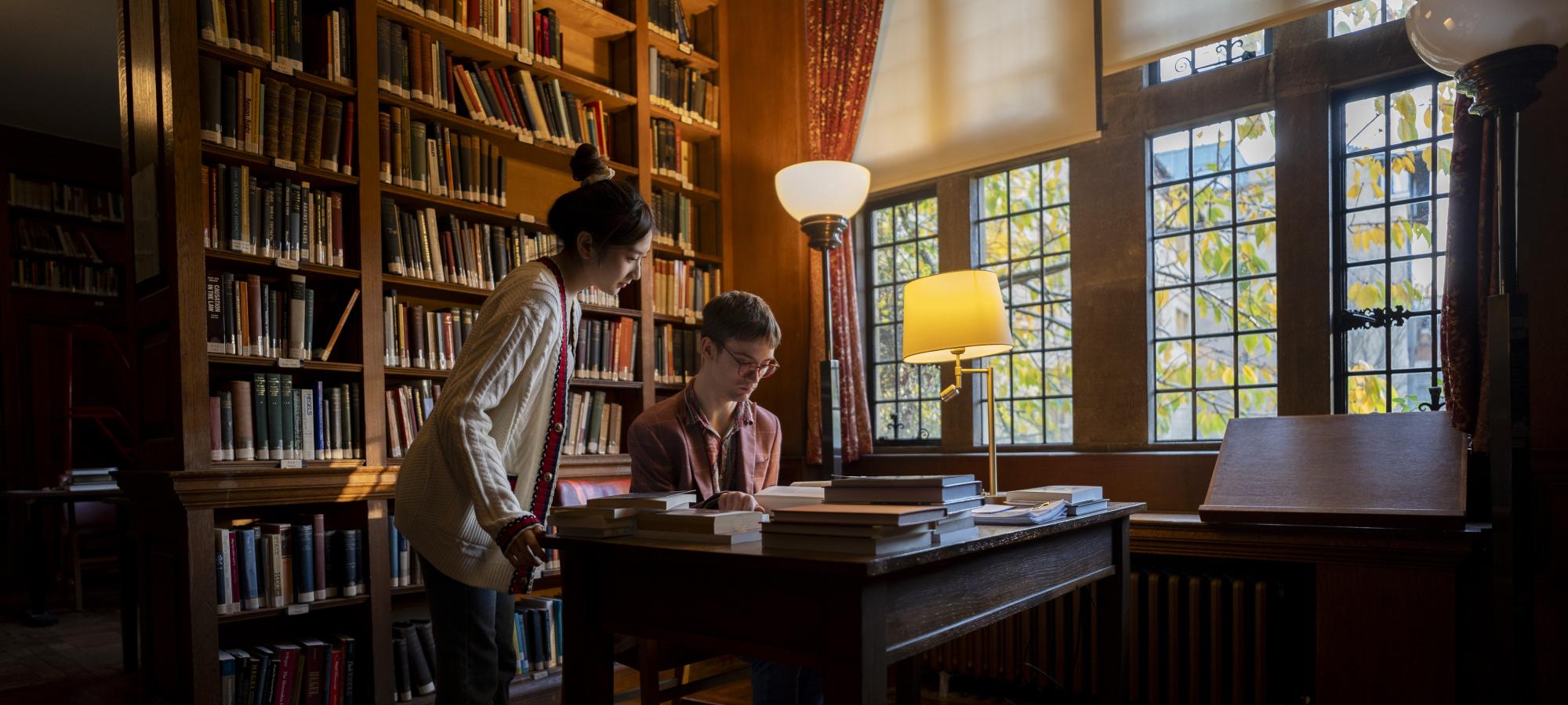 Two students in the library.
