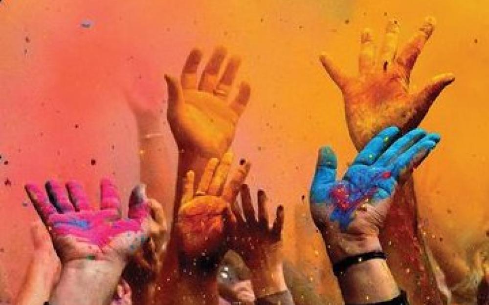 Painted hands in Holi Festival of Colour